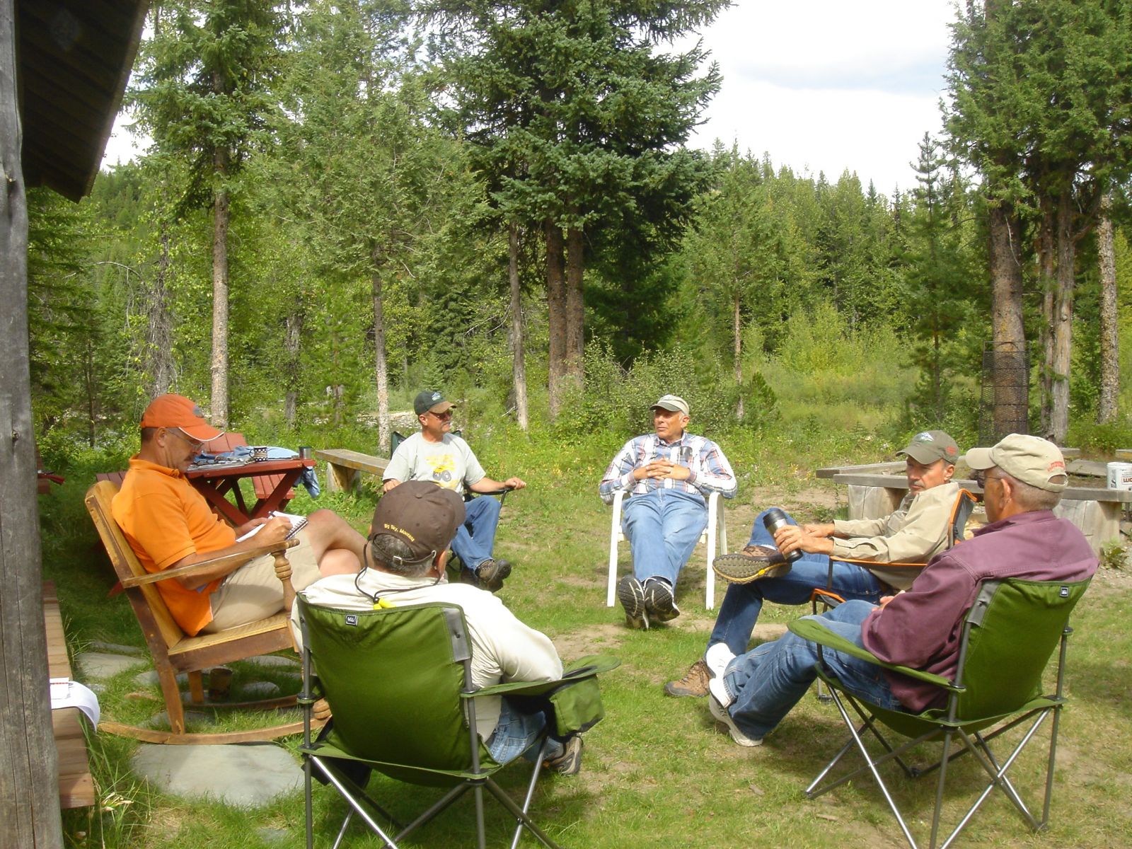 6 guys around the fire